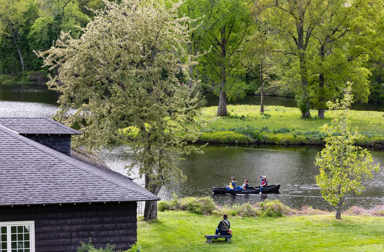 People in a canoe on Paradise Pond