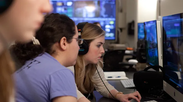 Group of students working at computer