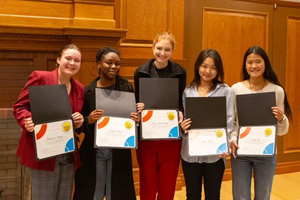 Pitch contest winners pose with their certificates.