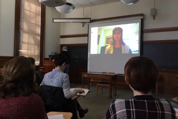 Students in a Smith government class conducting a Skype interview with New York Times reporter Coral Davenport '98.