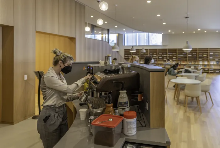 Barista making coffee in the Compass cafe.