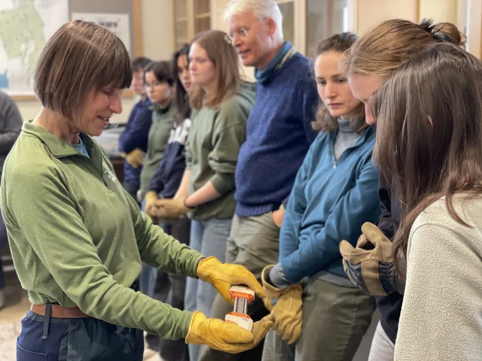 Brantley gives students a close-up look at chain saw components.