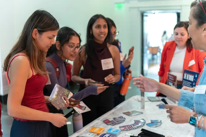 Students receive information about the Alumnae Association