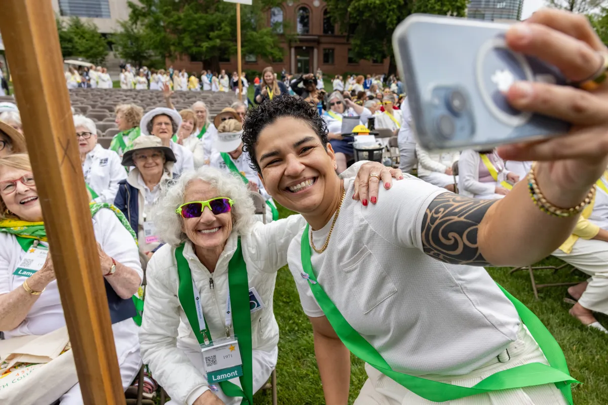 Smithies pose for a selfie after the alumnae parade