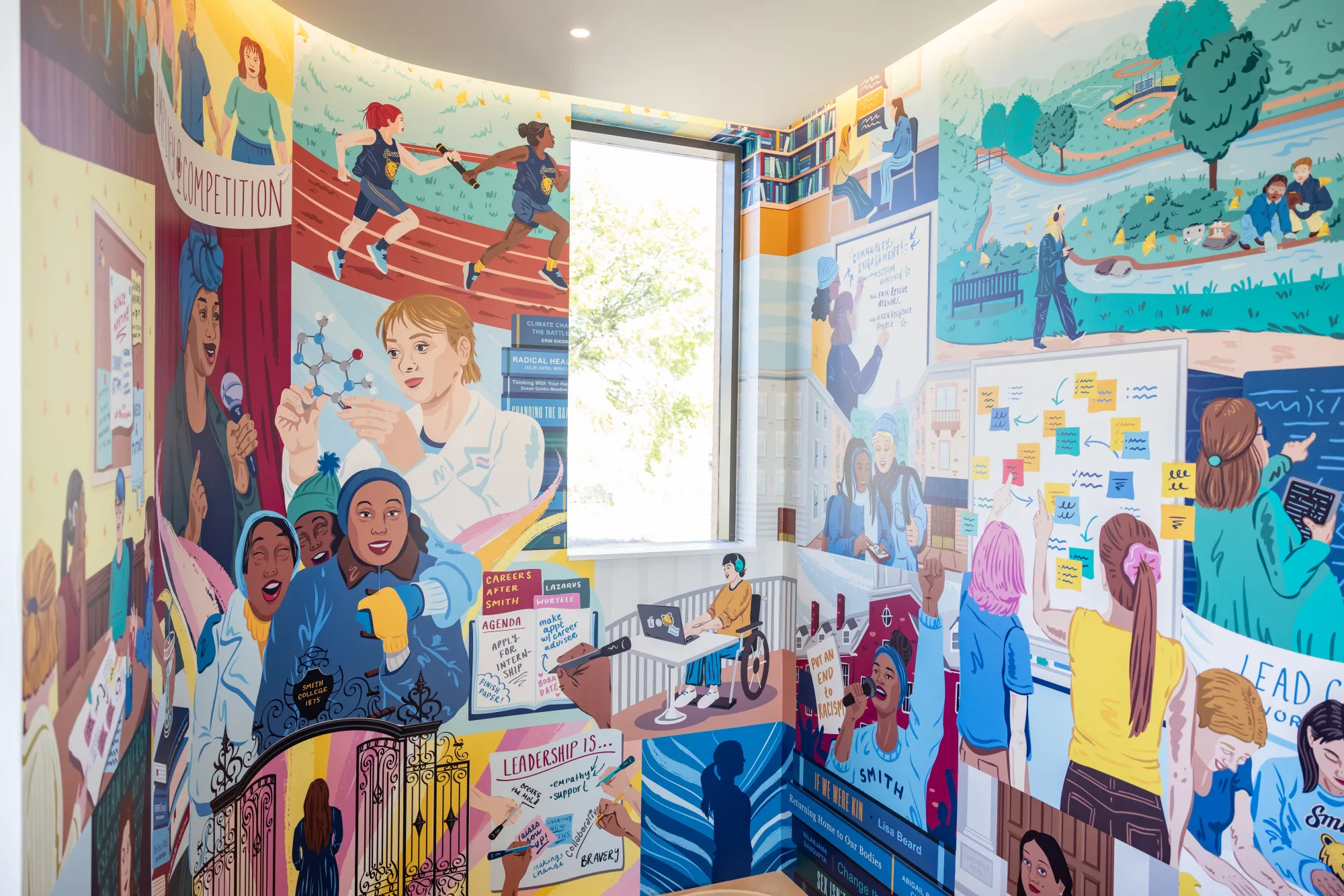 A wide view of the mural on the walls of Kathleen McCartney Hall, depicting common scenes of life at Smith—standing at the Grecourt Gates, students studying chemistry, a track and field meet, and much more.