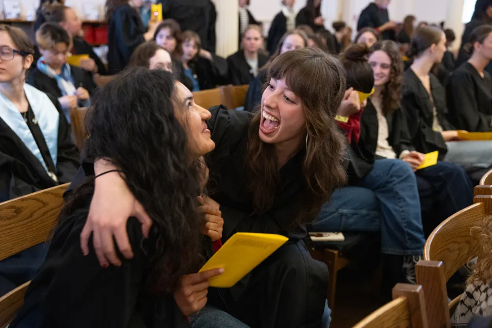 Students cheer during Baccalaureate